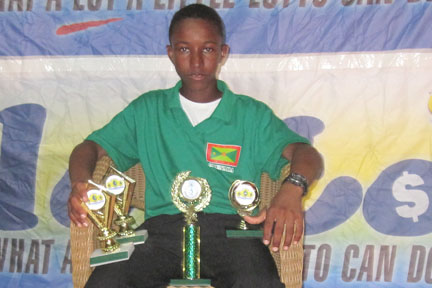 Grenada’s Emmanuel Stewart with his trophies.